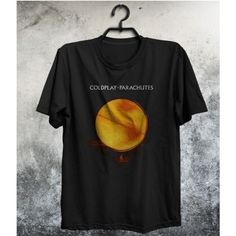 a black t - shirt with the words coldplay parachutes on it