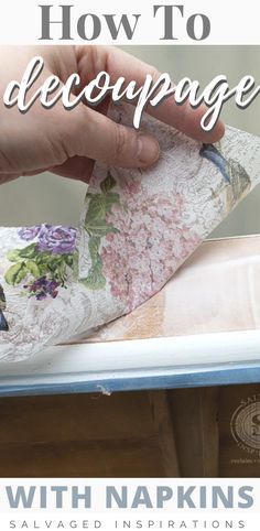 someone is decorating an old piece of furniture with floral fabric