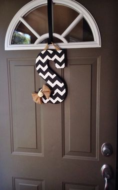 the door is decorated with black and white chevrons