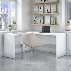 a white desk with a laptop on it in front of a window and some bookshelves