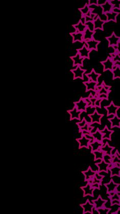 a black background with pink stars in the shape of an arrow on it's side