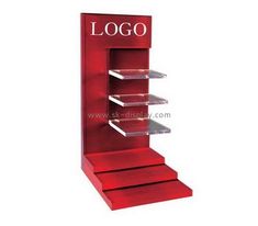 a red display case with three shelves and the word logo written on it's side