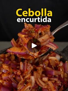 a spoon full of food with the words cebola encurtida on it