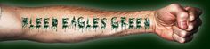 a hand with the words bleed eagles green painted on it's arm and wrist