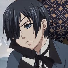 an anime character with black hair and blue eyes