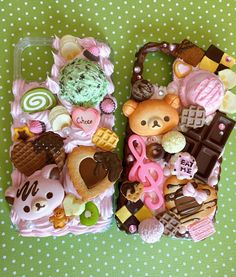 two cell phones are decorated with different types of candies and desserts on them