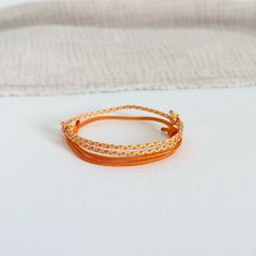 Set of two thin and adjustable orange cord bracelets for girls or women.These boho surf style bracelets are in cotton/nylon are 100% waterproof, do not fade, can be worn 24 hours a day and are hypoallergenic. They are handmade in our workshop Features : Dimensions: women's bracelets from 15 to 19 cm thanks to its sliding system They give a trendy look to your summer outfits. You can find other creations on my store: https://www.etsy.com/fr/shop/BordeplageFR Boho Surf, Bracelets For Girls, Bracelets Style, Style Surf, Orange Bracelet, Women's Bracelets, Surf Style, Boho Gifts, Bracelets For Women