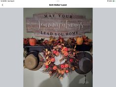 a wooden sign that says may your learning always lead you home with fall decorations and hats on it