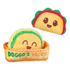 two stuffed tacos are sitting in an orange and green basket with the words pogo's tacos on it