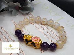 Gift yourself or your loveonce this simple yet elegant Pure Gold Pixiu Bracelet.  *Materials: Au999 Pure Gold, Amethyst, and Agate. *Karat: 24K Pure Gold  *Gold Color: Yellow *Gold Weight: Approx. 2.62g *Stone Size: Approx. 10mm *Pixiu Length: Approx. .84 Inch/21.4mm 🧧Pi Xiu is capable of warding off evil spirits, bringing good fortune and wealth. ●Metal will never fade.  NOT GOLD FILLED. NOT GOLD PLATED. NOT GOLD VERMEIL.   Made of real 24K Gold. 📬S H I P P I N G Free shipping in the US and International orders. Feng Shui Bracelet, Pixiu Bracelet, Bracelet Materials, Gold Armband, Minimalist Bracelet, Purim, Evil Spirits, Pure Gold, Gold Gold