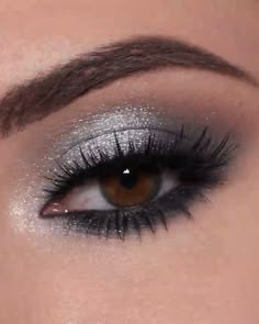 446K views · 33K reactions | A beautiful eye makeup look in grey🤩 | cosmetics | A beautiful eye makeup look in grey🤩 | By MetDaan Makeup | Do you guys love grey eye makeup looks? Cuz we have just t #макияж #макияжглаз #макияждляновичков #макияжглазпошагово #макияждляначинающих #макияждлянависшеговека #урокимакияжа Bold Silver Eye Makeup, Grey Makeup For Brown Eyes, Shimmery Smokey Eye, Black And Grey Makeup Looks, Eye Makeup Grey Eyes, Gray Eyeshadow Looks For Brown Eyes, Gray Dress Makeup Look, Gray Eyes Makeup