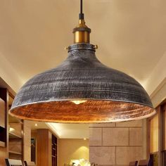 a kitchen with a large blue dome light hanging from the ceiling