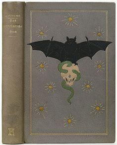 an open book with a drawing of a bat on it's cover and the words,