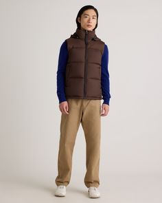 The perfect vest for your cold-weather adventures is here: our Responsible Down Puffer Vest. You'll be warm and protected in all types of weather, and the water-repellent and wind-resistant fabric make this vest perfect for any winter activity. The classic fit allows extra room for layering, so you can wear it as a layering piece in cooler temperatures, or with a lightweight tee as the temperature rises. Plus, our down products are sourced responsibly to ensure best practices in animal welfare. Down Vest With Padded Collar, Sleeveless Down Vest With Padded Collar, Sleeveless Vest With Fleece Lining For Outdoor Activities, Sleeveless Outdoor Work Vest For Fall, Winter Outdoor Vest With Fleece Lining, Sleeveless Outdoor Winter Outerwear, Sleeveless Brown Outerwear For Outdoor, Fall Outdoor Vest Outerwear, Functional Hooded Nylon Vest