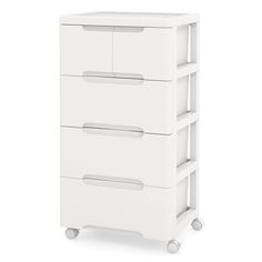 a white dresser with three drawers on wheels