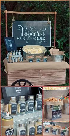 an outdoor buffet with food and drinks on the table, along with chalkboard signs