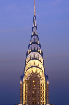 a very tall building lit up at night