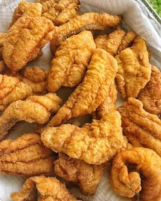 fried chicken pieces in a basket ready to be eaten