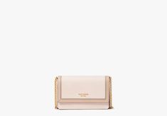 We have your link to traveling light. Meet our Morgan flap chain wallet with colorblocked detailing. | Kate Spade Morgan Colorblocked Flap Chain Wallet, Pale Dogwood