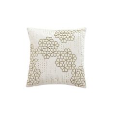 a white and gold decorative pillow on a white background, with an intricate design in the middle