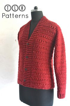 a mannequin wearing a red knitted cardigan