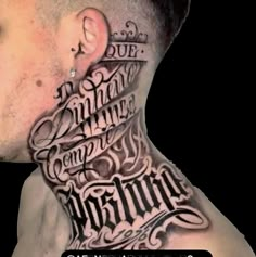 a man with tattoos on his neck and chest