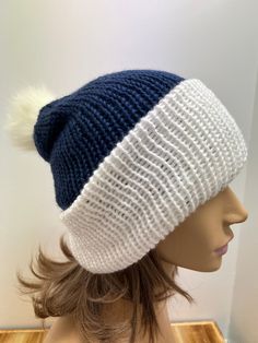 This handmade hat is the perfect accessory for you. It can be worn slouchy or cuffed and has a lovely matching pom pom. It is double knit for added warmth.  💕 SIZE/MATERIAL: Material - Acrylic Adult - One size fit most, Measures 22" stretches to 24" W x 15" L.  Adult XL - Measures 24" stretches to 26" W x 15 L.    💕 COLORS: Shades of Navy Blue and White 💕 PROCESSING TIME: Your item is already made and will ship immediately after purchase 💕 SHIPPING TIME: 2-5 business days within the US via USPS First Class Mail 💕 GIFTS: You can ship our products directly to your gift recipient. We'd be happy to include a complimentary gift note. Please send us the text you'd like to us to use in the notes to seller field. 💕 CARE: Machine wash cold, lay flat to dry 💕 Click here to see more handmade t Shades Of Navy Blue, Crochet Adult Hat, Mail Gifts, Colors Shades, Handmade Hat, Winter Beanie, Double Knit, Double Knitting, Santa Hat