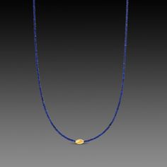 A strand of deep blue, matte lapis beads is beautifully accented with a single 22k gold rice bead. Simple and elegant. Lovely by itself, or layered with other necklaces. Matte finish. Layered Bead Necklaces, Gold Single Strand Lapis Lazuli Beaded Necklace, Blue Beads Necklace, Simple Beaded Necklaces, Lapis Necklace, Inspirational Jewelry, Rice Bead, Jewelry Accessories Ideas, Unusual Jewelry