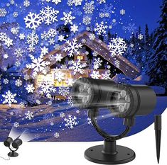 an outdoor security camera with snowflakes in the background