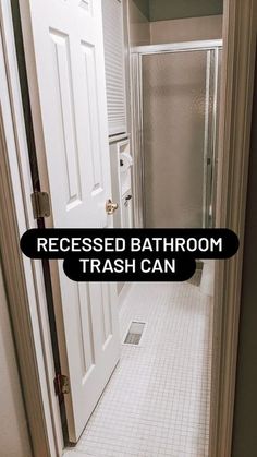 a bathroom door with the words recessed bathroom trash can on it's side