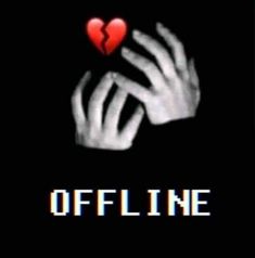 a hand holding a red heart with the words offline on it in front of a black background