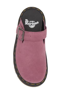 An updated clog made with soft, silky suede and a hybrid air-cushioned sole offers versatile style and lasting comfort so you can wear it all year. The hybrid air-cushioned sole fuses featherweight EVA with rugged PVC for durable underfoot support. An adjustable slingback strap provides a secure fit, while the Goodyear-welted construction and signature yellow stitching deliver the brand's well-known durability. 1 1/4" heel; 1" platform Adjustable slingback strap with buckle closure Cushioned footbed Leather upper/textile lining/synthetic sole Imported Doc Marten Socks, Bedrock Clogs, Shoe Inspo Women, Dr Martens Clogs, Doc Marten Clogs, Woman’s Shoes, Dr Martens Slides, Birkenstocks Clogs, Pink Clogs