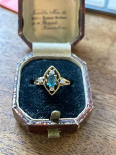 Vintage Genuine Spinel Ring from the 1970's  approx. .40ct Spinel approx. 6.5x4.5mm  Marked 375 inside the shank= 9k gold beautiful Navette design 4 surrounding stones do not test as genuine diamonds ...priced accordingly 2.8grams Size 7 . It is easily sized up or down by a skilled jeweler.  Excellent shape Blue spinel is a genuine gemstone that is associated with many metaphysical properties and symbolism, including: inner peace, truth, wisdom, intuition, calmness, protection, communication, an Vintage 14k Gold Sapphire Ring, Vintage 14k Gold Sapphire Birthstone Ring, Vintage 14k Gold Rings With Birthstone, Vintage Blue Cluster Ring With Center Stone, Vintage Yellow Gold Cluster Ring With Birthstone, Vintage Marquise Sapphire Ring For Formal Occasions, Vintage Oval Sapphire Birthstone Ring, Vintage 14k Gold Birthstone Ring With Center Stone, Blue Vintage Cluster Ring With Center Stone