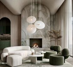 an elegant living room with white furniture and marble walls, along with large round pendant lights hanging from the ceiling