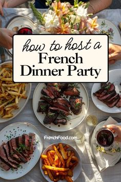 a table topped with plates of food covered in meat and french fries next to a glass of wine