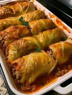 stuffed cabbage rolls in a casserole dish ready to be eaten