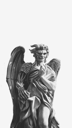 an angel statue is shown in black and white