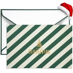 a green and white striped christmas card with a santa hat on it's head