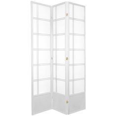 a white room divider with glass panels