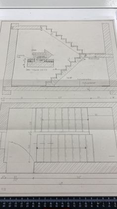 an architectural drawing of a building with stairs