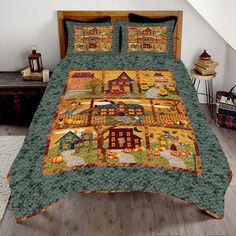 a bed with a quilt on it in a room