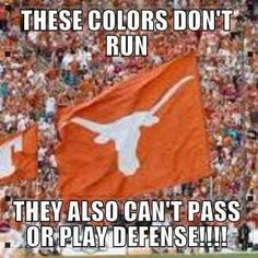 the texas flag is flying in front of an audience at a football game with words that read, these colors don't run they also can't pass or play defense