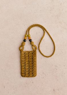 Crossed over;Hand-woven raffia;Made in our Madagascan workshop;Raffia exterior;Unlined;Resin beads;Length of handle: 51 cm / 20 in;Due to its construction, this model does not have an inside pocket;Dimensions: 18 x 0.7 x 11 cm / 7 x 0 x 4.3 in Crochet Bags With Beads, Granny Square Crochet Patterns Free, Raffia Bag, Macrame Bag, Woven Raffia, Craft Bags, Basket Bag, Resin Beads, Handle Bag