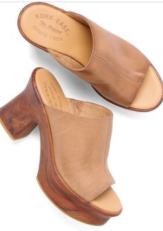 Take your outfit to the next level with our Cassia Platform Sandal in Brown Terra! These gorgeous and comfortable sandals are perfect for day to night wear, thanks to their cushioned footbed and high-traction rubber outsole. Made with hand-finished Italian leather and a faux wood covered platform heel. 3.75" heel height, 1.5" platform Wood Cover, Night Wear, Platform Heel, Brown Sandals, Comfortable Sandals, Faux Wood, Platform Heels, Sweater Accessories, Platform Sandals