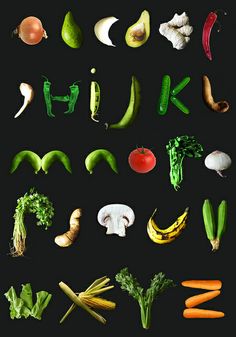 an assortment of vegetables are arranged in the shape of alphabets on a black background