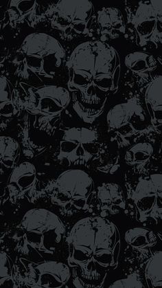 a lot of skulls that are all over the place with black and white paint on them