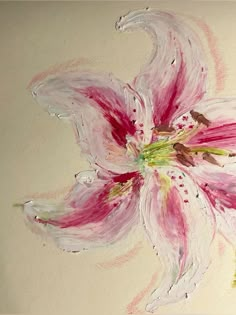 a painting of a pink flower on a white wall