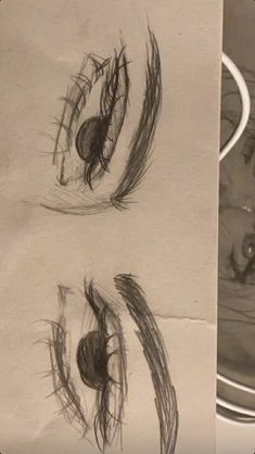 two drawings of an eye with long eyelashes