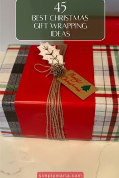 a present wrapped in red and green plaid paper with the words best christmas gift wrapping ideas