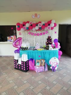 a birthday party with balloons and decorations